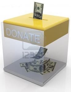 A donation box with a few prominent notes
