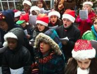 Children carol singing.