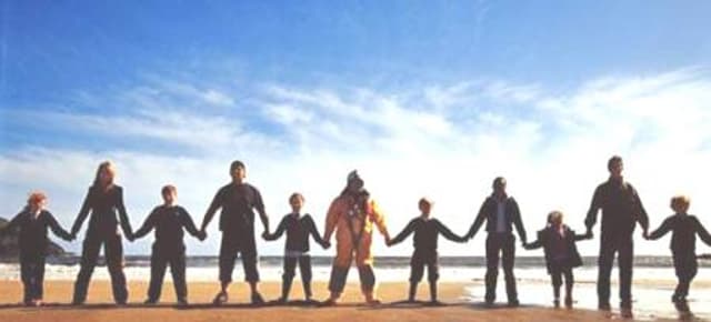 The emotive image of an RNLI crew member holding the hands of the people he rescues brought the case for support to life.