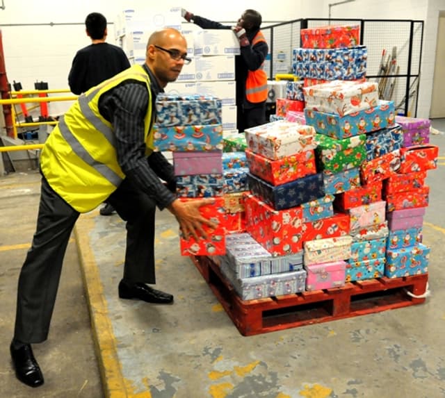 Operation Christmas Child rely on volunteers to help deliver the shoeboxes to children overseas.